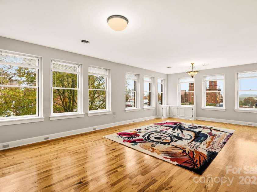 60 Haywood Street, Asheville, NC 28801.  MLS# CAR4317577, YatesRealty ID 659. Abundant Natural Light* Lovely Views