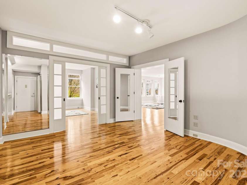 60 Haywood Street, Asheville, NC 28801.  MLS# CAR4317577, YatesRealty ID 659. Bedroom Quarters Include 2 Bedrooms, Main Bathroom, Flex Space, Walk-in Closet, and Laundry