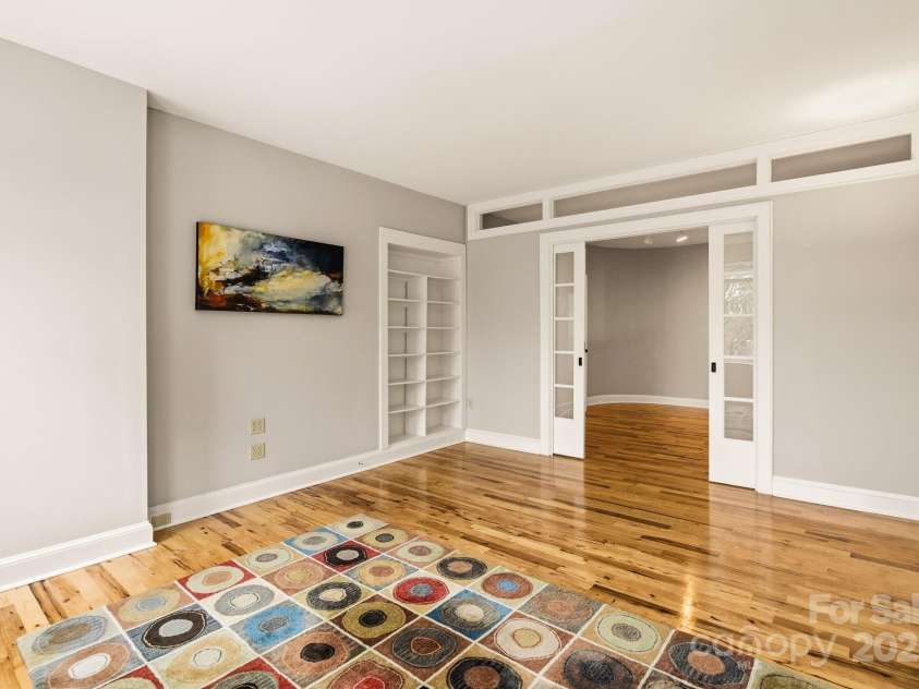 60 Haywood Street, Asheville, NC 28801.  MLS# CAR4317577, YatesRealty ID 659. Custom Built-ins and Pocket Doors 