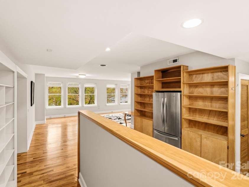 60 Haywood Street, Asheville, NC 28801.  MLS# CAR4317577, YatesRealty ID 659. Maple Cabinets * Entrance to Condo Opens to Kitchen/Living Area 