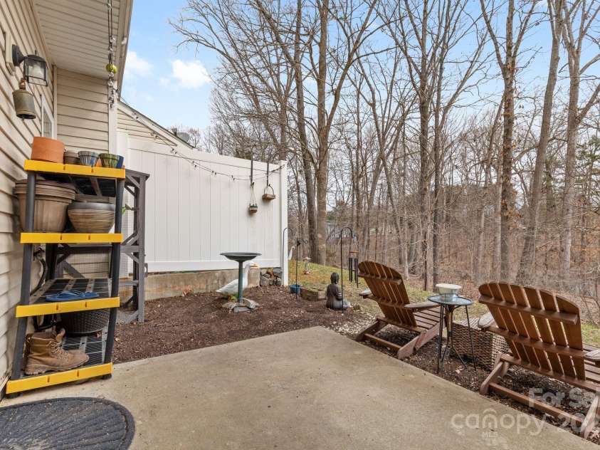 3028 Summerfield Ridge Lane, Matthews, NC 28105.  MLS# CAR4219617, YatesRealty ID 6596. Back to this patio space-- awesome, and can be fenced if privacy is preferred