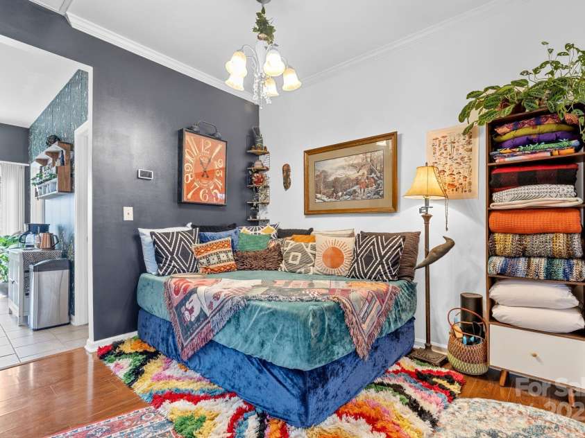 3028 Summerfield Ridge Lane, Matthews, NC 28105.  MLS# CAR4219617, YatesRealty ID 6596. Dining area in front of kitchen, stairs, half bath, and laundry-- ideal for a daybed too!