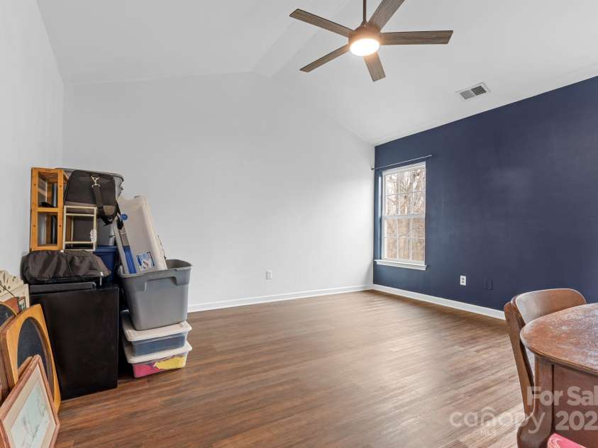 3028 Summerfield Ridge Lane, Matthews, NC 28105.  MLS# CAR4219617, YatesRealty ID 6596. Once upstairs, you'll find 3 bedrooms and two full baths-- primary with vaulted ceilings