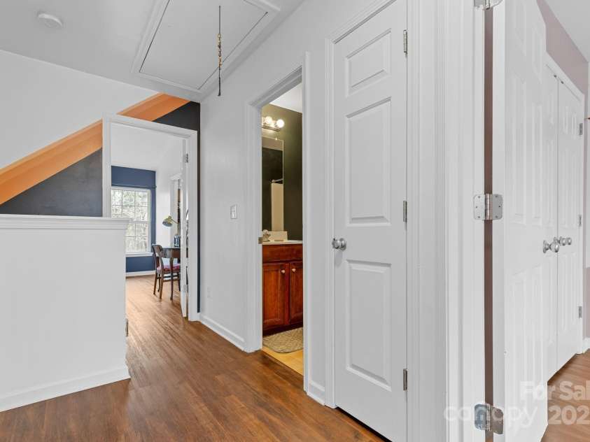 3028 Summerfield Ridge Lane, Matthews, NC 28105.  MLS# CAR4219617, YatesRealty ID 6596. Upstairs Hall from secondaries to primary