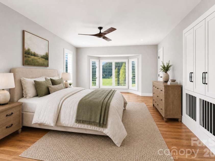 155 Winding Meadows Drive, Flat Rock, NC 28731.  MLS# CAR4418480, YatesRealty ID 6600. Virtually Staged primary bedroom main level