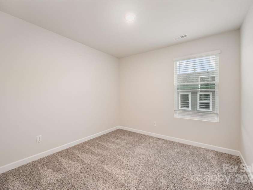4548 Millennium Avenue, Charlotte, NC 28217.  MLS# CAR4224869, YatesRealty ID 6601. Main Level Bedroom