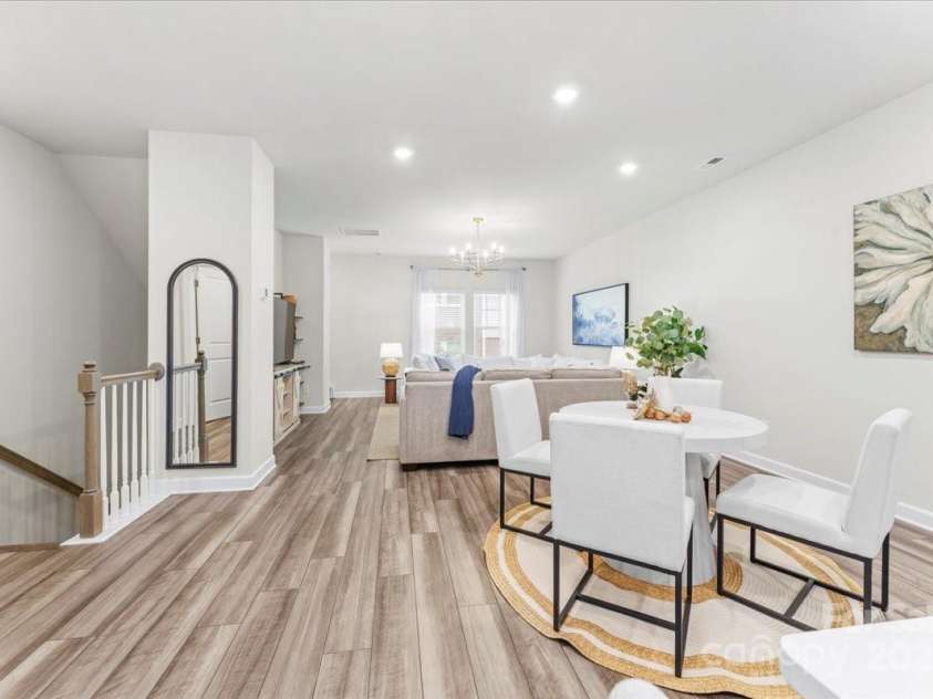 4548 Millennium Avenue, Charlotte, NC 28217.  MLS# CAR4311347, YatesRealty ID 6601. Dining area and living room