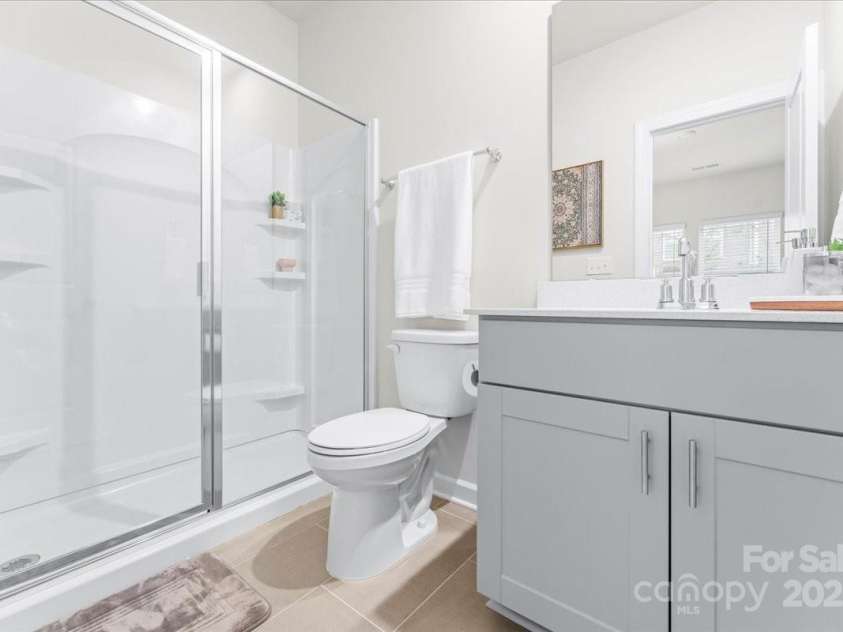 4548 Millennium Avenue, Charlotte, NC 28217.  MLS# CAR4311347, YatesRealty ID 6601. En-suite bathroom 