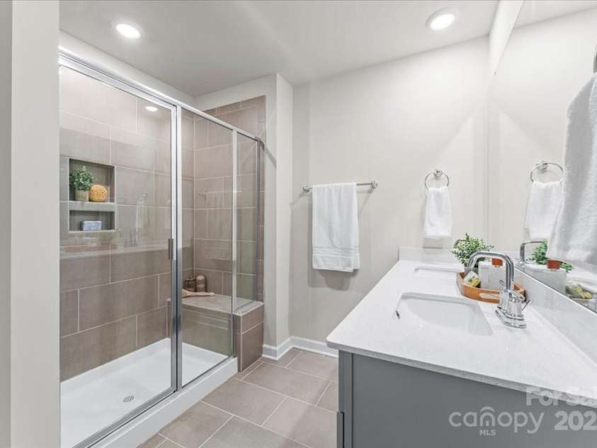 4548 Millennium Avenue, Charlotte, NC 28217.  MLS# CAR4311347, YatesRealty ID 6601. En-suite bathroom in owner's suite