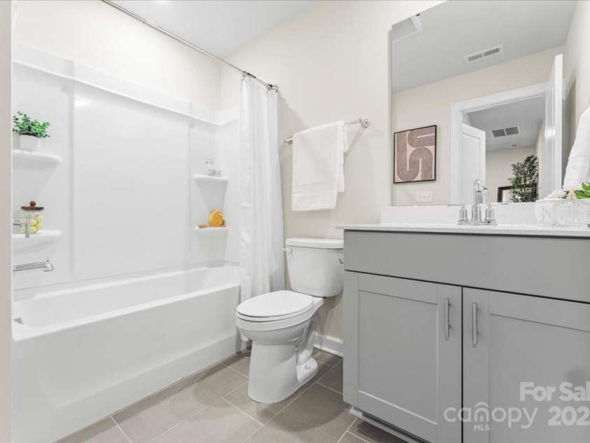 4548 Millennium Avenue, Charlotte, NC 28217.  MLS# CAR4311347, YatesRealty ID 6601. Full bathroom on the third floor