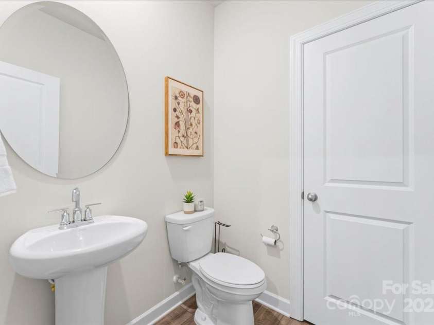 4548 Millennium Avenue, Charlotte, NC 28217.  MLS# CAR4311347, YatesRealty ID 6601. Half bath on the second floor