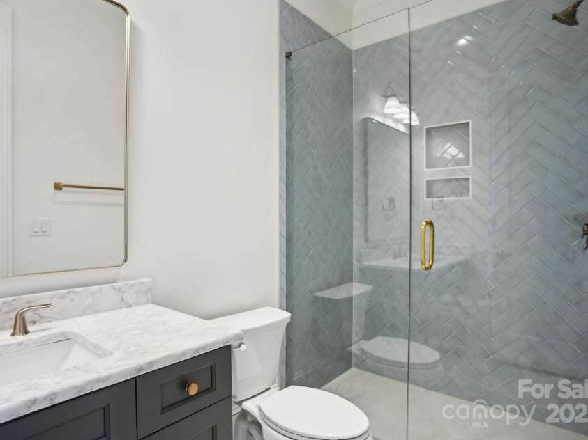 8813 Graham Road, Denver, NC 28037.  MLS# CAR4238880, YatesRealty ID 6603. 2nd full bathroom in the basement located within one of the bedrooms