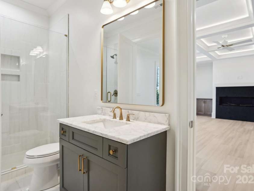 8813 Graham Road, Denver, NC 28037.  MLS# CAR4238880, YatesRealty ID 6603. Basement full bathroom accessing living area and one of the basement bedrooms.