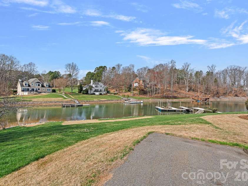 125 Grand Bay Drive, Mooresville, NC 28117.  MLS# CAR4341347, YatesRealty ID 6607. Back Yard