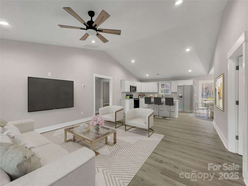 1212 Belmont Circle Drive, Lancaster, SC 29720.  MLS# CAR4247060, YatesRealty ID 6610. Living Room opens right up to the Kitchen      *virtually staged Representative Photo