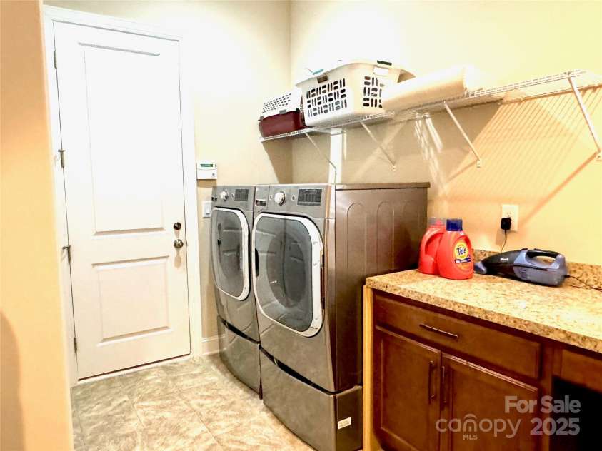 151 Chimney Rock Court, Denver, NC 28037.  MLS# CAR4238113, YatesRealty ID 6616. Expanded Laundry Room