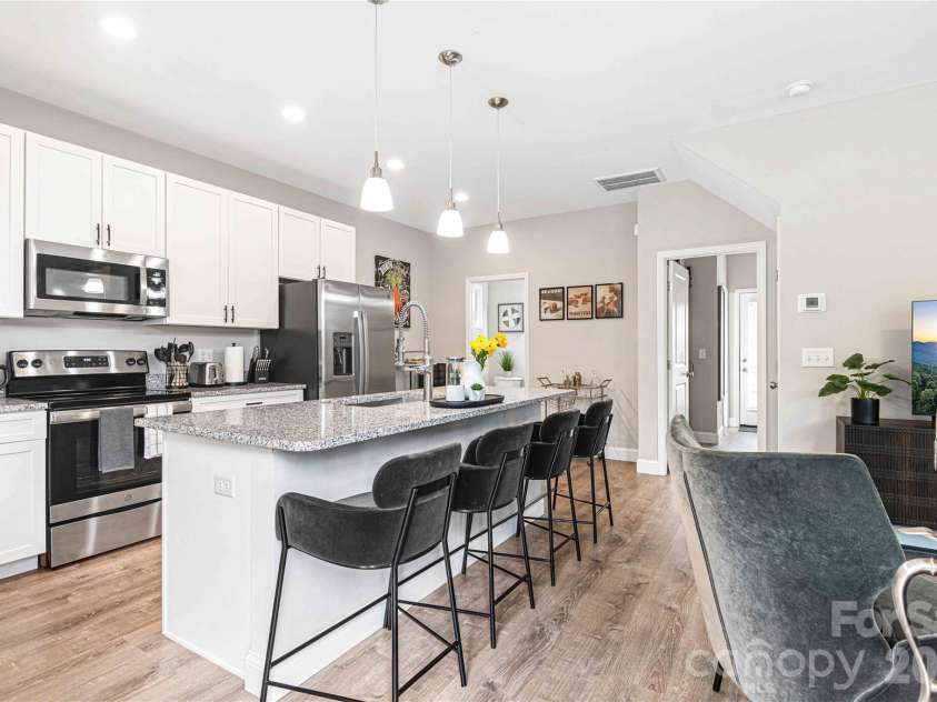 22 Daniel Road, Asheville, NC 28806.  MLS# CAR4347037, YatesRealty ID 6623. Open kitchen and dining space