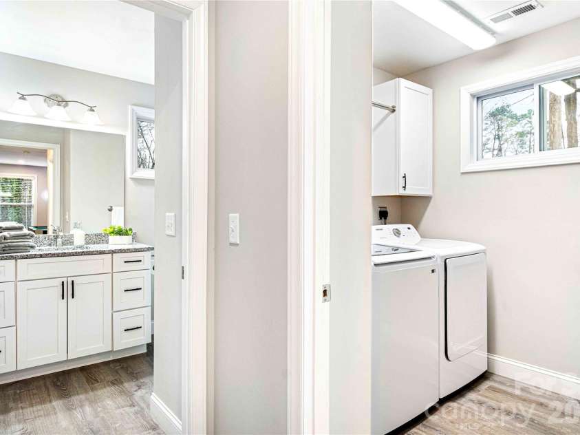 22 Daniel Road, Asheville, NC 28806.  MLS# CAR4347037, YatesRealty ID 6623. Second floor bathroom and laundry