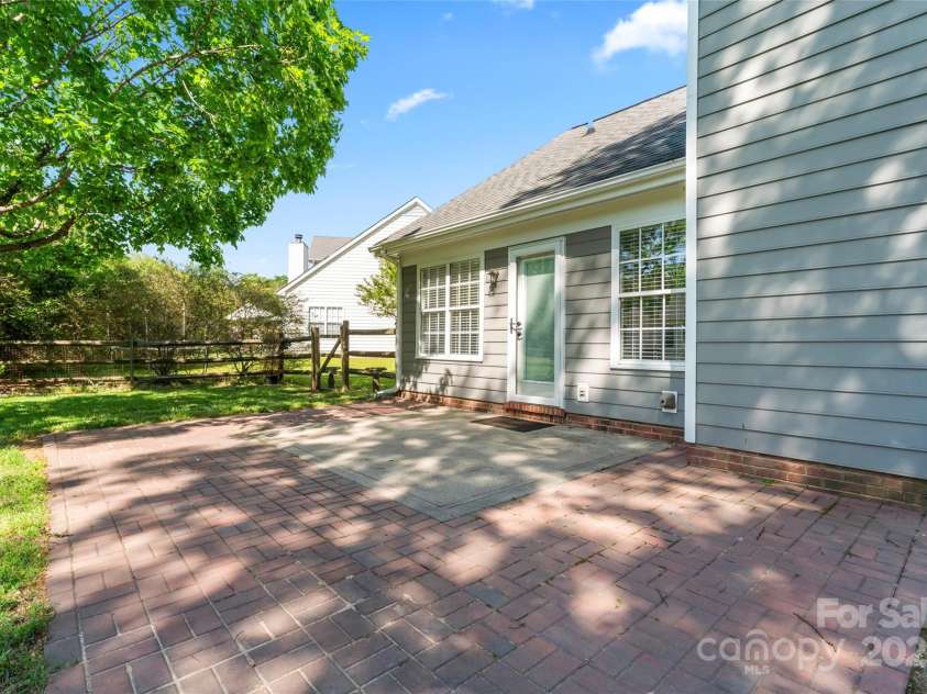 1347 Eisenhower Place, Concord, NC 28027.  MLS# CAR4234135, YatesRealty ID 6626. Back view