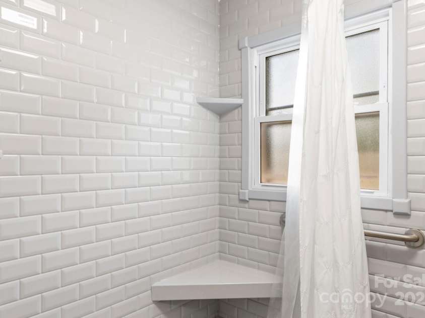 313 Main Street, Morganton, NC 28655.  MLS# CAR4275502, YatesRealty ID 663. Primary bathroom shower.