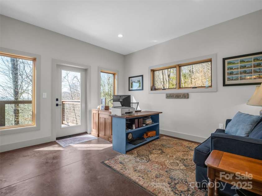 151 Sandys Home Place, Mars Hill, NC 28754.  MLS# CAR4224775, YatesRealty ID 6630. Lower level office/living space