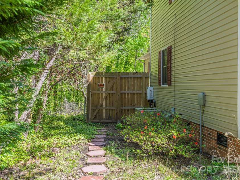 2804 Lake Hill Court, High Point, NC 27265.  MLS# CAR4246605, YatesRealty ID 6635. Side yard