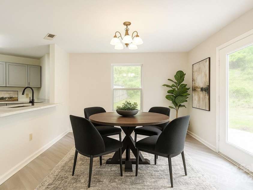 3227 Deshler Morris Lane, Charlotte, NC 28216.  MLS# CAR4244473, YatesRealty ID 6645. Virtual staged breakfast nook