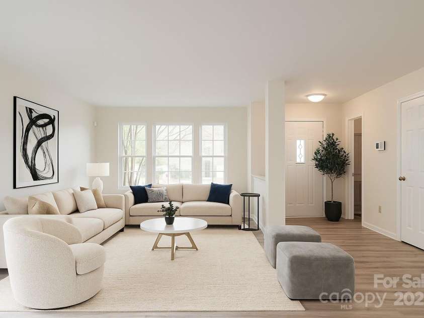 3227 Deshler Morris Lane, Charlotte, NC 28216.  MLS# CAR4244473, YatesRealty ID 6645. Virtual staged living room