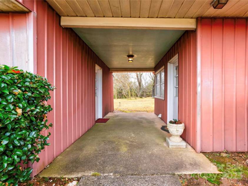 3809 Polkville Road, Shelby, NC 28150.  MLS# CAR4327106, YatesRealty ID 665. Breezeway from Garage