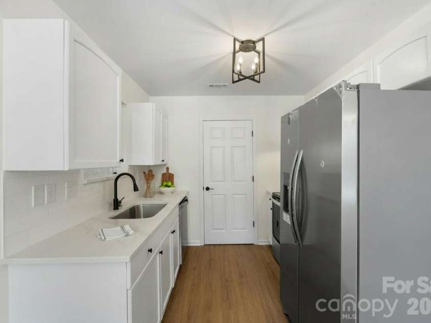 11434 Northwoods Forest Drive, Charlotte, NC 28214.  MLS# CAR4358069, YatesRealty ID 6651. Kitchen_Virtually Staged