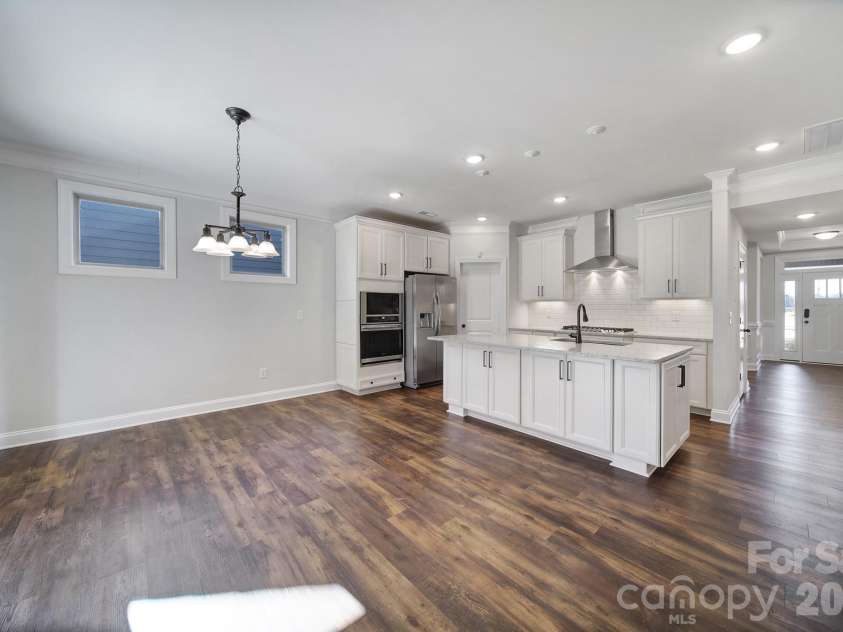 2118 Old Evergreen Parkway, Indian Trail, NC 28079.  MLS# CAR4331774, YatesRealty ID 6652. Eating Area, Kitchen, and Main Hallway.