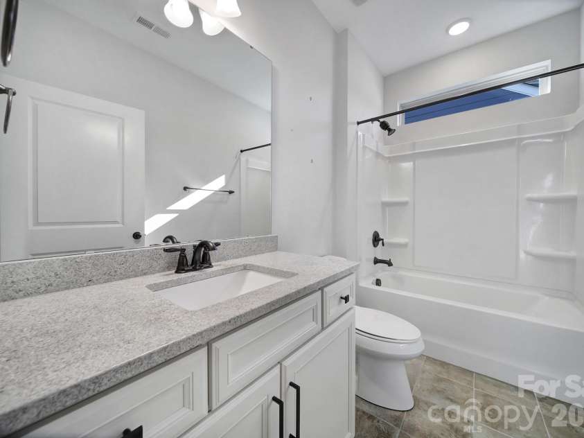 2118 Old Evergreen Parkway, Indian Trail, NC 28079.  MLS# CAR4331774, YatesRealty ID 6652. Hall Bathroom
