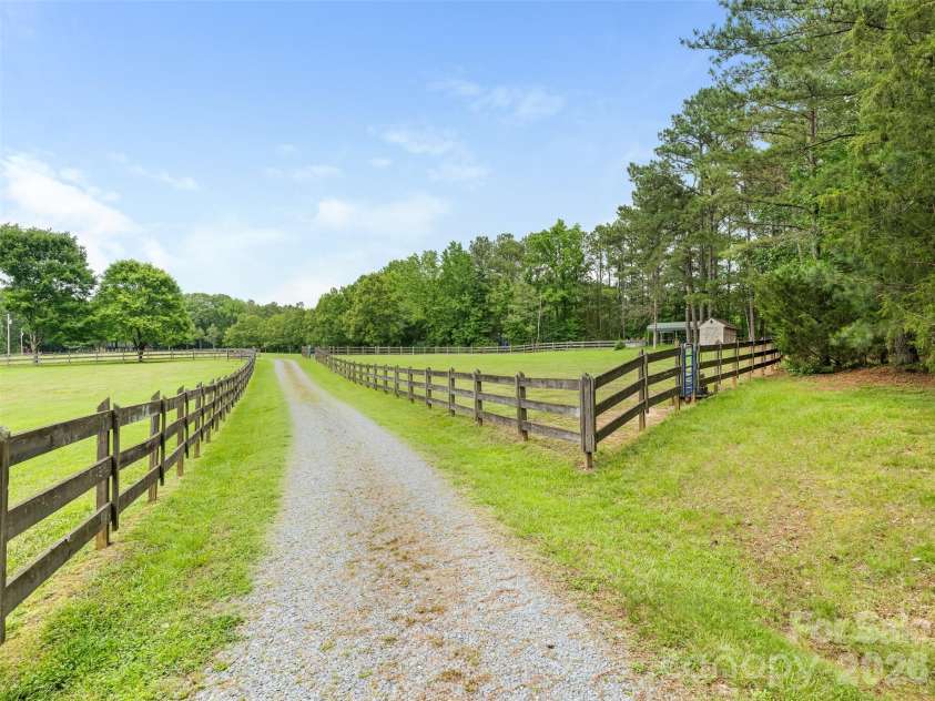 7712 Old Waxhaw Monroe Road, Waxhaw, NC 28173.  MLS# CAR4388099, YatesRealty ID 6654. Two established pastures