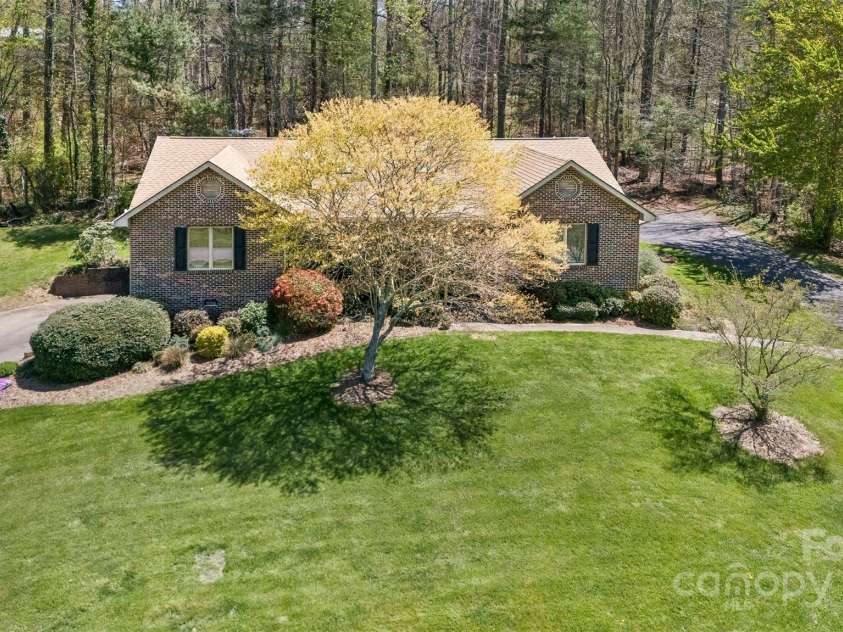 147 Canaan Drive, Candler, NC 28715.  MLS# CAR4248195, YatesRealty ID 6658. Aerial.