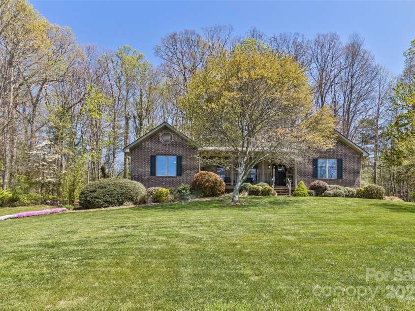 147 Canaan Drive, Candler, NC 28715.  MLS# CAR4248195, YatesRealty ID 6658. Front of Home.