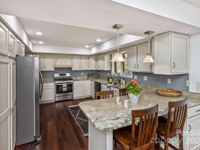 147 Canaan Drive, Candler, NC 28715.  MLS# CAR4248195, YatesRealty ID 6658. Kitchen.