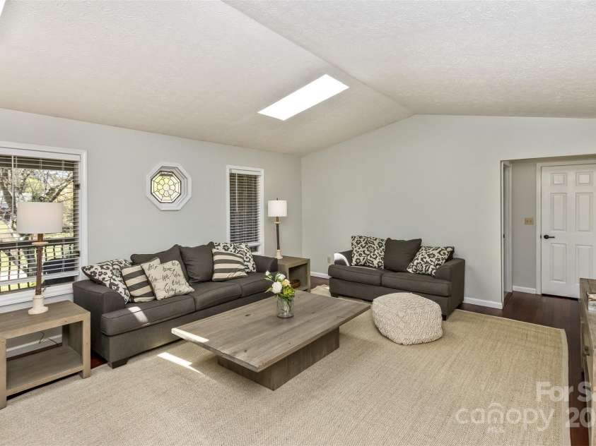 147 Canaan Drive, Candler, NC 28715.  MLS# CAR4248195, YatesRealty ID 6658. Living Room.