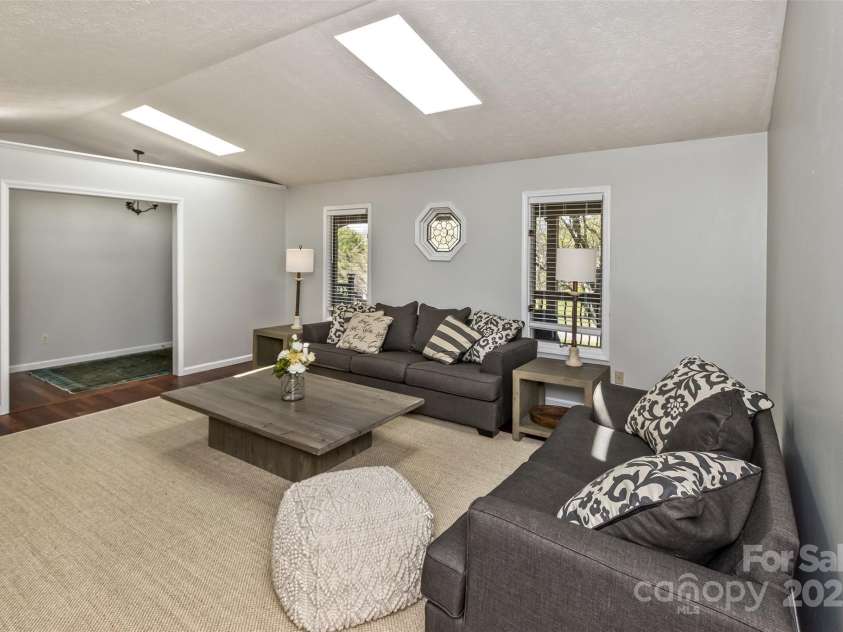 147 Canaan Drive, Candler, NC 28715.  MLS# CAR4248195, YatesRealty ID 6658. Living Room.