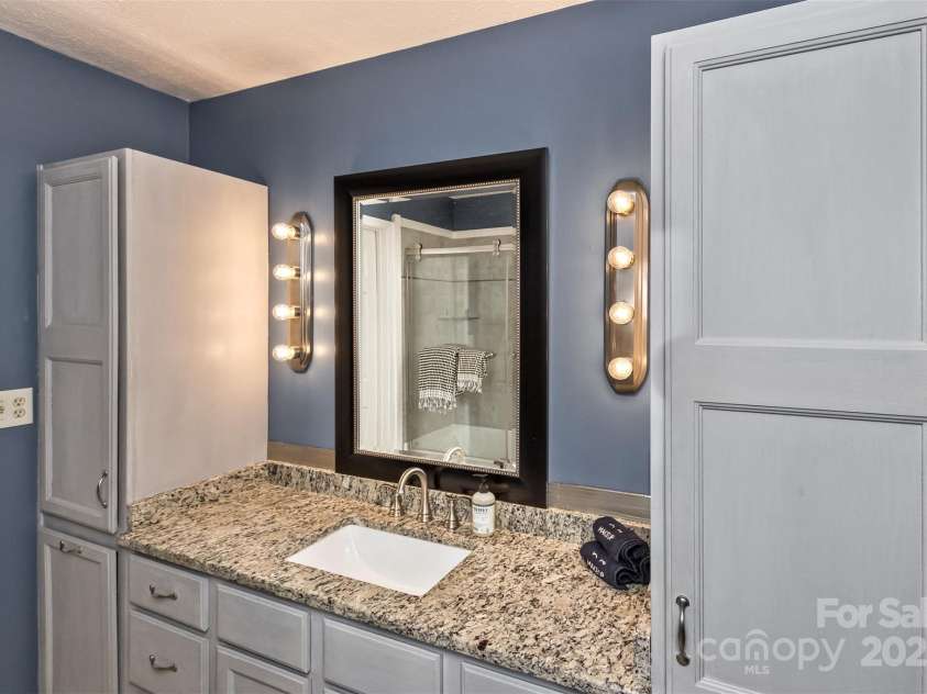 147 Canaan Drive, Candler, NC 28715.  MLS# CAR4248195, YatesRealty ID 6658. Primary Bathroom