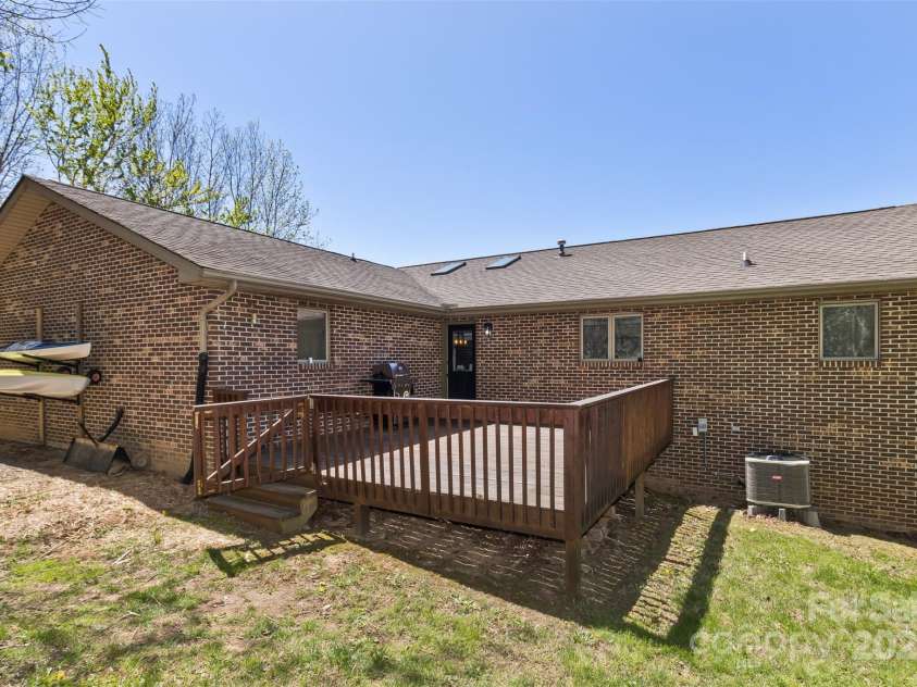 147 Canaan Drive, Candler, NC 28715.  MLS# CAR4248195, YatesRealty ID 6658. Rear Deck.