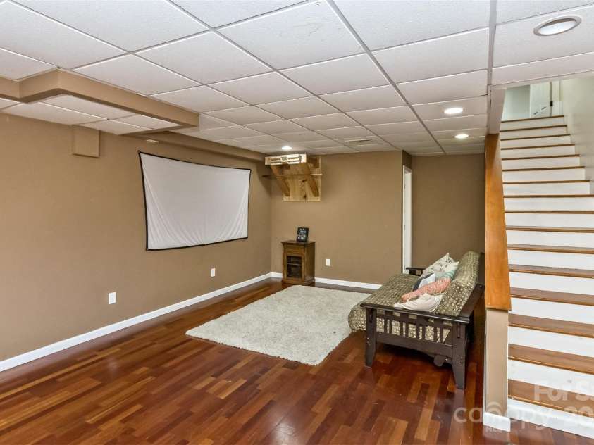147 Canaan Drive, Candler, NC 28715.  MLS# CAR4248195, YatesRealty ID 6658. Stairs to Downstairs Rec. Ro