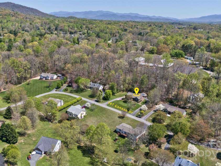 147 Canaan Drive, Candler, NC 28715.  MLS# CAR4248195, YatesRealty ID 6658. Surrounding Mountains.