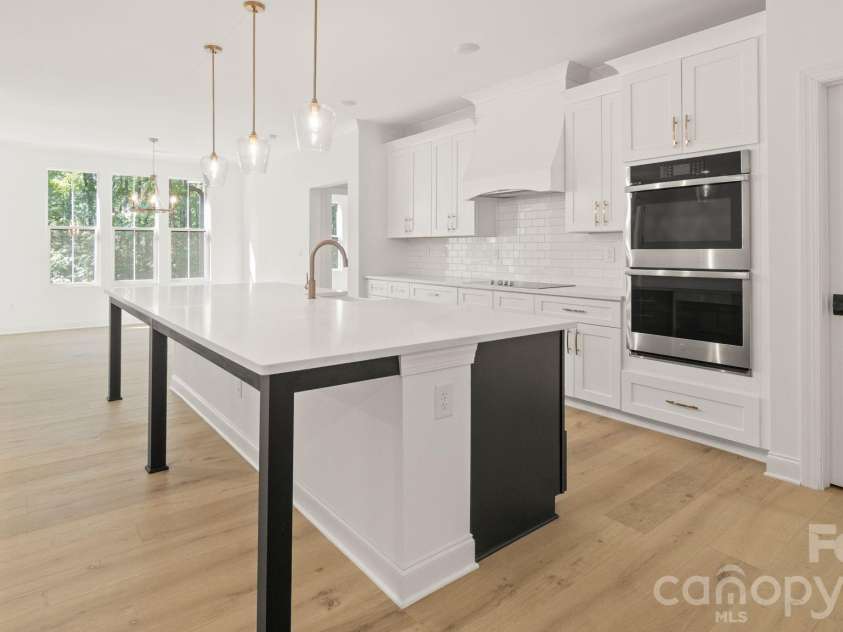 6774 Kingfisher Court, Denver, NC 28037.  MLS# CAR4327366, YatesRealty ID 6662. Kitchen to Dining