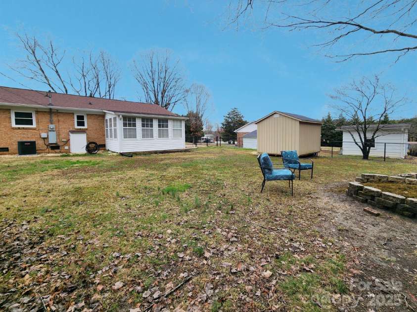 114 Eller Road, Gastonia, NC 28056.  MLS# CAR4222623, YatesRealty ID 6663. Spacious yard- room to roam