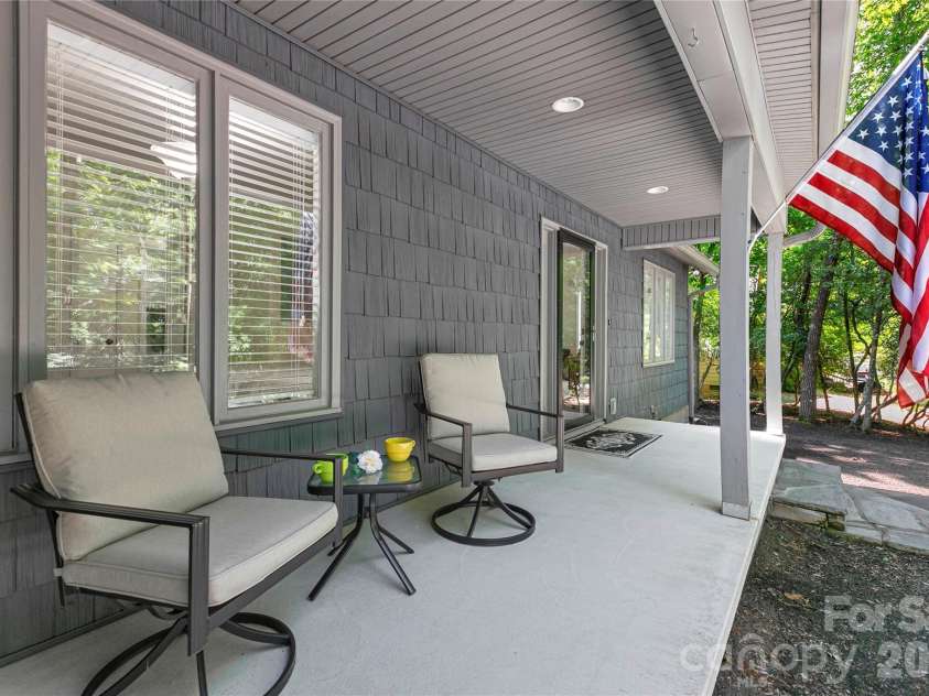 222 Sedi Lane, Brevard, NC 28712.  MLS# CAR4403900, YatesRealty ID 6666. Comfortable Front Porch