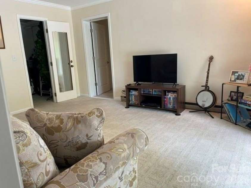 222 Sedi Lane, Brevard, NC 28712.  MLS# CAR4403900, YatesRealty ID 6666. Relaxing Den