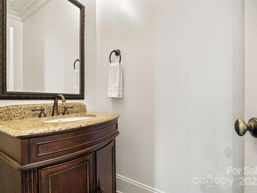107 Bare Foot Lane, Mooresville, NC 28117.  MLS# CAR4240937, YatesRealty ID 6669. Main Level Powder Room