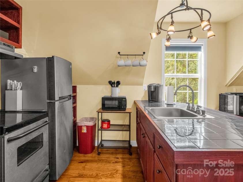 2001 Laurel Park Highway, Hendersonville, NC 28739.  MLS# CAR4246182, YatesRealty ID 6670. 2nd Living Qtrs.