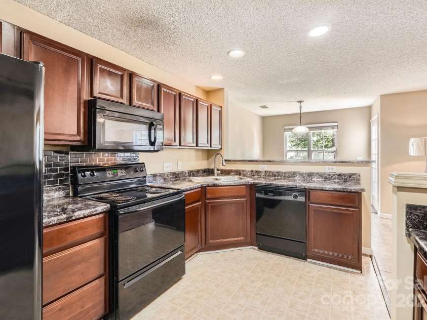 3420 Caldwell Ridge Parkway, Charlotte, NC 28213.  MLS# CAR4244733, YatesRealty ID 6674. Large kitchen with abundant storage!