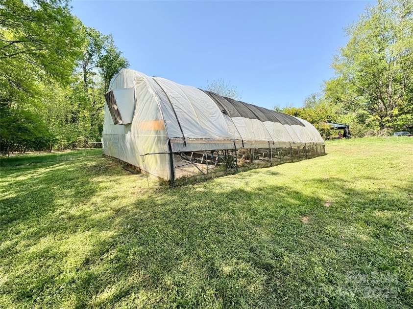 2724 Peachtree Road, Statesville, NC 28625.  MLS# CAR4248826, YatesRealty ID 6676. Greenhouse will convey or seller is willing to remove is not needed.